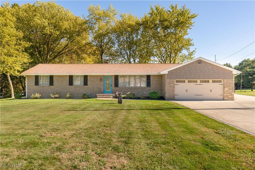 This beautifully updated brick ranch sits on a spacious .47-acre lot in Jackson LSD, offering the perfect blend of modern style and family-friendly comfort. From the moment you arrive, the charming front porch and walkway welcome you into this bright 2,123 sq ft home. The spacious great room is bathed in natural light, featuring gleaming wood floors that continue throughout the home and a hall closet for convenience. The updated eat-in kitchen boasts granite countertops, a breakfast bar, stainless steel appliances, and a dining area with wainscoting and a hanging light. Open to the kitchen is the cozy family room with a feature stone wall wood wood-burning fireplace, and access to the deck. Outdoor entertainment is made easy with the perfect spot for relaxation, tranquil views. The large backyard also includes a shed (10x20) for extra storage. The main floor features three generous bedrooms and a full bath, including a master suite. Offering a private ensuite with a tile walk-in shower and his and hers closets, the master suite was made with convenience in mind. The partially finished basement expands your living space with a vast recreational room, a bonus storage room, a laundry area with a utility sink, and a crawl space for additional storage. The attached two-car garage and bonus RV parking pad add convenience. The home’s prime location, tucked in a charming neighborhood yet close to Belden shopping and just minutes from the highway, makes commuting effortless. Move-in ready, this home is truly a must-see. Schedule your private showing today.
