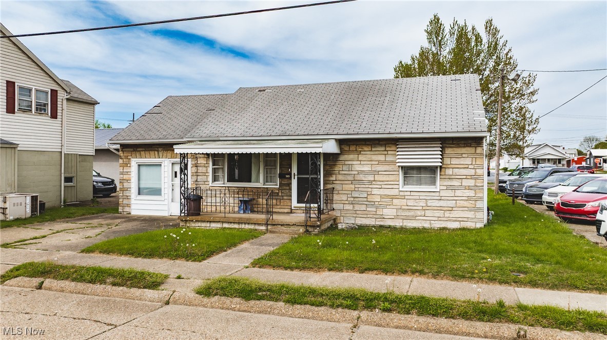 This versatile property was most recently used as a residence but is also zoned for commercial use, offering endless possibilities! The home features two bedrooms, one full bath, a comfortable living room, and an eat-in kitchen. An attached garage provides convenient parking, with the laundry area located in the rear portion of the garage. The back lot is easily accessible via the alley between Dairy Queen and Parkersburg Veterinary Properties.