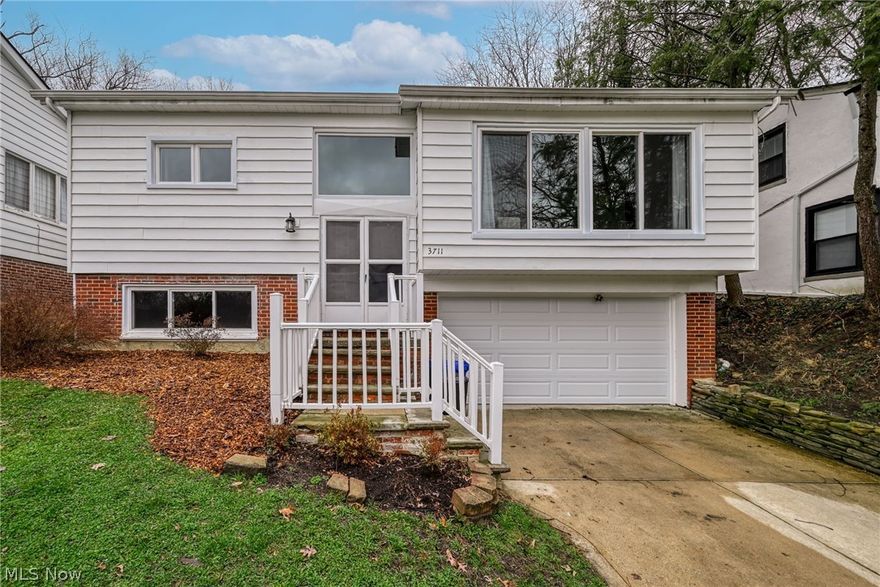 Beautifully updated and truly move-in ready, this 3-bedroom, 2.5-bath raised ranch offers style, space, and functionality throughout.  Located in desirable area of University Heights.  Enter through the double doors into a crisp foyer with high ceilings and an open, airy feel. The sun-drenched living room connects naturally to a spacious dining area with sliding doors that lead to a stone patio—perfect for indoor-outdoor living. 
The eat-in kitchen has been refreshed with granite countertops, a sleek backsplash, updated fixtures, and appliances that remain. The spacious primary suite features a walk-in closet, and a renovated bath.  The additional bathrooms have also been thoughtfully updated.
A finished lower level provides flexible space for a second living area, home office, or playroom. Recent improvements include new AC and furnace (2023–2024), a new large picture window and front door window (2024), and several bedroom windows replaced (2025). Additional updates include a newer roof, some vinyl replacement windows, newer flooring.  
Complete with an attached 2-car garage and a generous backyard. POS compliant. Ideally located in a quiet neighborhood close to schools, parks, shopping, dining, and more.