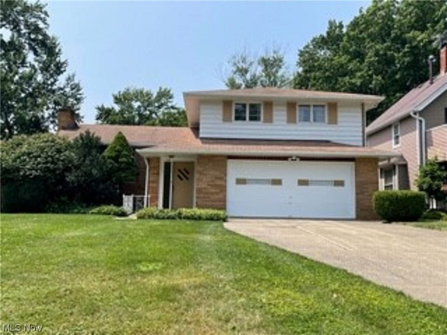 Imagine the thrill of seeing Lake Erie as you approach the driveway to your all brick 3 bedroom 2 bath home. This short dead-end road is a quiet, friendly haven north of Lakeshore with shopping, transportation, schools and highways close by. The split level house offers a large family room with a wood burning fireplace and access to a deck, private back yard, combination mud room and laundry plus a large closet, a kitchen with ample eating area, formal dining and large living room with another wood burning fireplace. The second floor has a master bedroom with private bath and two twin-sized bedrooms with a 2nd hall bath. This house and its pristine location make a winning combination. Call for improvement details.