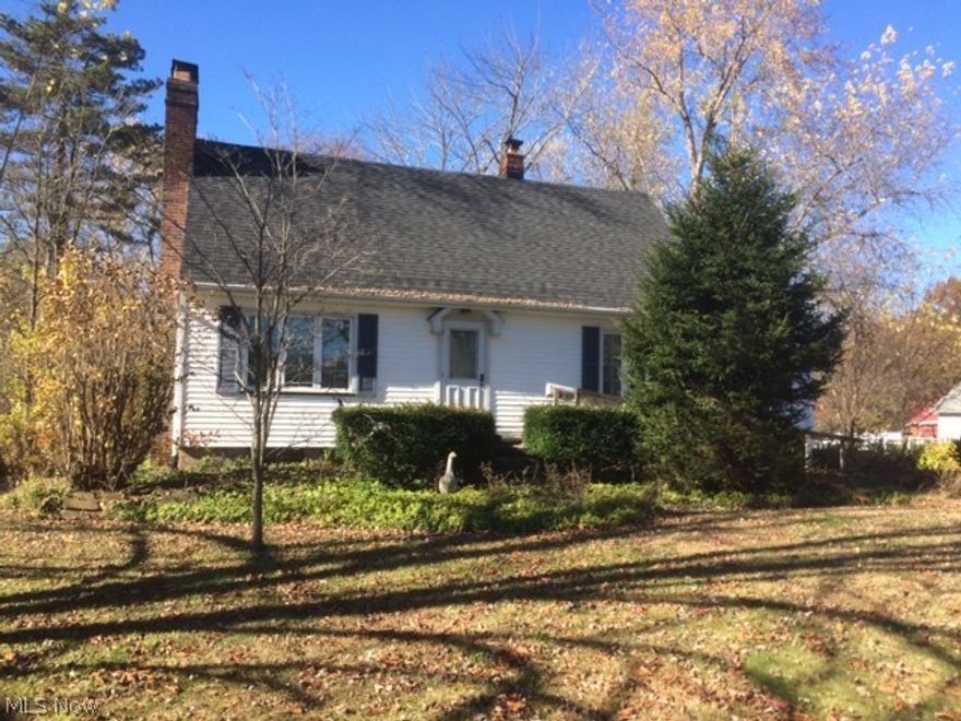 Spread out on 2.48 Acres in this Cute 3 Bedroom, 2 Bath Vinyl Sided Cape Cod.  Good Curb appeal.   Home has 2 wood burning fireplaces, Newer Roof, New Drive and Newer 2 Car Detached Garage.