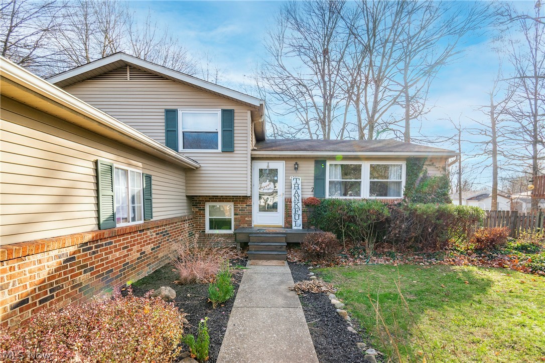 Welcome home to 199 Oakhurst Drive! This beautiful split level boasts three bedrooms, two full bathrooms, a fully fenced in backyard, and more! The main level offers a spacious living room, kitchen complete with stainless steel appliances, and a dining room granting access to your back deck. You will find three bedrooms and the first full bathroom on the upper level. Venture downstairs to relax in your family room next to a cozy brick fireplace and a bar area. An updated full bathroom, laundry/storage area, and a room currently being used as a fourth bedroom round out the lower level. Enjoy your evenings in your large private backyard featuring two decks, great for entertaining! 1 year warranty included for your peace of mind. Don't miss your opportunity to own this home. Schedule your private viewing today!