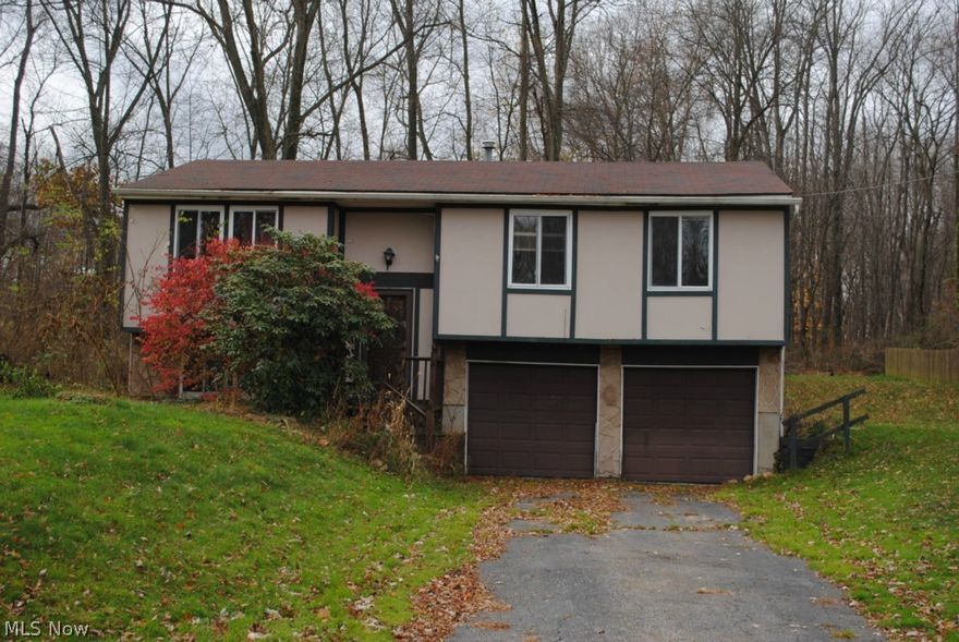 BANK OWNED ....  Bi-Level Located At The End Of The Street On A Culdesac .... 3 Bedrooms, 1.5 Baths .... Nice Large Living Room .... Formal Dining Room .... Eat-In Kitchen .... Recreation Room In The Basement ....  2 Car Attached Garage ....  Enclosed Back Porch .... Storage Shed .... Secluded Wooded Property ....