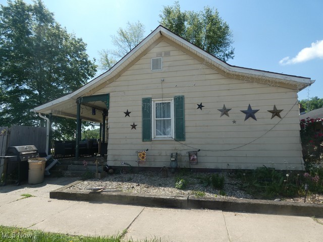 If you're looking for a great investment, you won't want to miss seeing this one story home offering 2 bedrooms with the potential of a 3rd, nice oak kitchen cabinets, 1 bath, full basement, vinyl siding, 2 car garage, a large, level 3 parcel lot and LOTS of potential!!!