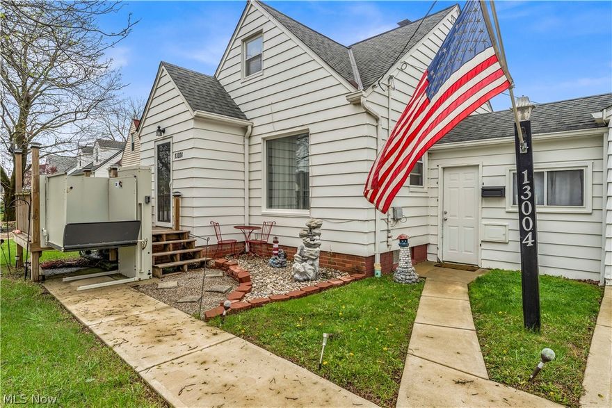 Great yard!!!   
Charming Cape Cod home on a double lot featuring a recently replaced driveway and front walk. Covered patio was built in 2025 for a quiet spot to relax. Enclosed breezeway connects the home to a two-car garage with added storage. Bright living room with oversized windows, updated kitchen with newer countertops, new cabinets, new flooring, fresh paint and all appliances (2023) are included. First floor offers two bedrooms and a full bath with a large walk in shower. Upstairs you will find a third bedroom plus bonus room—ideal for office or flex space. Full basement provides additional rec space, laundry (washer/dryer stay), and utility sink. Major updates include updated electrical, flooring and appliances Hardwood floors under most carpeted areas.