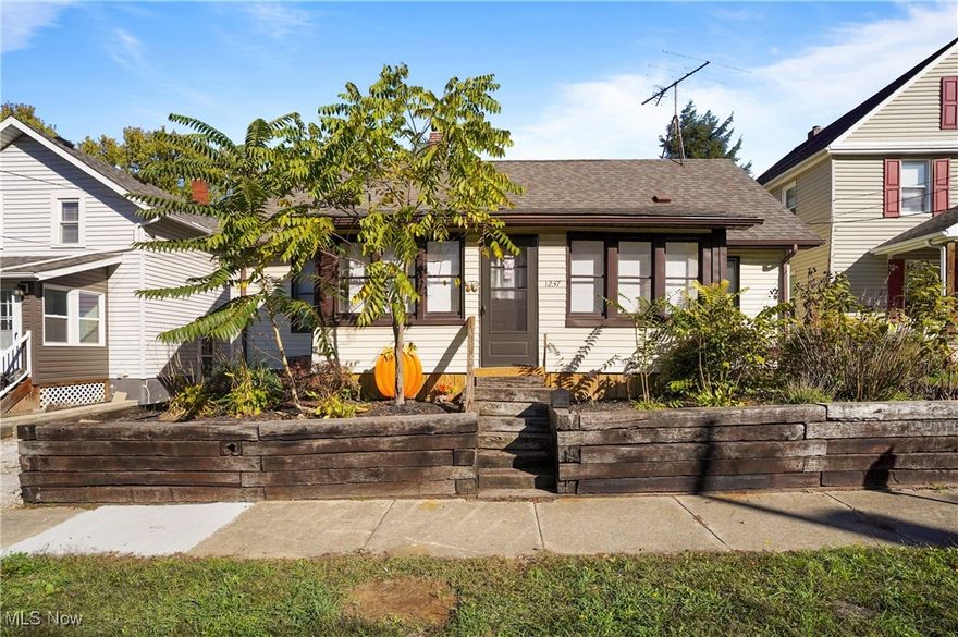 Welcome to this beautifully maintained and move-in ready home located in the heart of Kenmore, Akron, Ohio. This charming property blends original craftsmanship with thoughtful updates, offering the perfect mix of comfort and convenience.

Step up to the enclosed front porch, a cozy spot to enjoy your morning coffee or unwind at the end of the day. Inside, you’ll find a spacious living room that flows seamlessly into the formal dining room, complete with original woodwork and built-in cabinetry—a true nod to the home’s timeless character.

The first-floor bedroom features gleaming wood floors and a walk-in closet, while the full bathroom provides plenty of space and natural light.  Upstairs, the second bedroom spans the entire upper level, making it an excellent primary suite, guest area, or home office.

The updated kitchen includes all major appliances—refrigerator, range, microwave, and dishwasher—perfect for everyday living. A mudroom/enclosed back porch leads to the fenced backyard, ideal for pets, play, or entertaining.

Additional highlights include:

Full basement with newer washer and dryer (purchased in 2022)  Newer glass block windows

Newer carpet and luxury vinyl plank flooring (about two years old)

Off-street parking for 4–5 cars via rear alley access

Located on a quiet street in Akron’s desirable Kenmore neighborhood, this home is close to major highways, shopping, dining, parks, and schools, providing easy access to everything Northeast Ohio has to offer.

Whether you’re a first-time homebuyer, downsizer, or investor, this home offers incredible value and timeless appeal. Don’t miss your chance to own a move-in ready Kenmore home—schedule your private showing today!