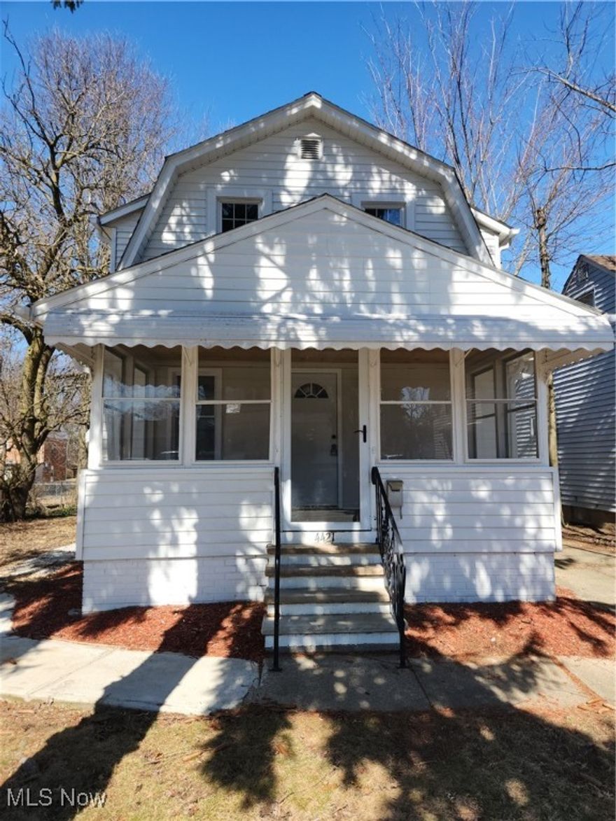New vinyl flooring and paint accompany this charming 2 bedroom, 1 bath Bungalow that is move-in ready.  Formal Dining Room, washer and dryer hook up in the basement.  Brand new refrigerator, dishwasher and stove. Lovely granite countertops with undermount sink.  Front porch for entertaining.  Security deposit and one month rent due at signing.  12 month lease. Full credit and background check required.  Call today for your private showing.  No garage.