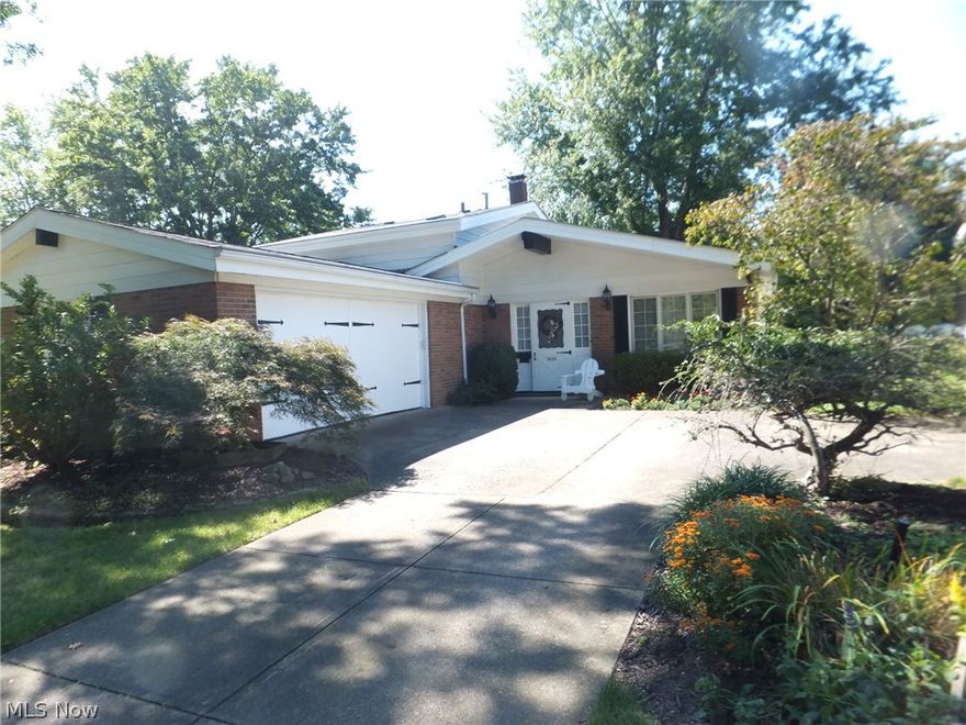 Well cared for and loved by its owner. Gleaming hardwood floors extend from foyer to gorgeous quality eat-in fully equipped kitchen, built in cook top, range, refrigerator, microwave, disposal, dishwasher,  corian counters & more. Recently painted neutral decor - roof replaced in 2007 - updated wiring - added attic insulation, lower level family room - 4th bedroom, full bath pus 1/2 bath. Upstairs 3 additional bedrooms & full bath. Hardwood floors. 
Stanek Vinyl clad window & patio door replaced in Liv. Rm.