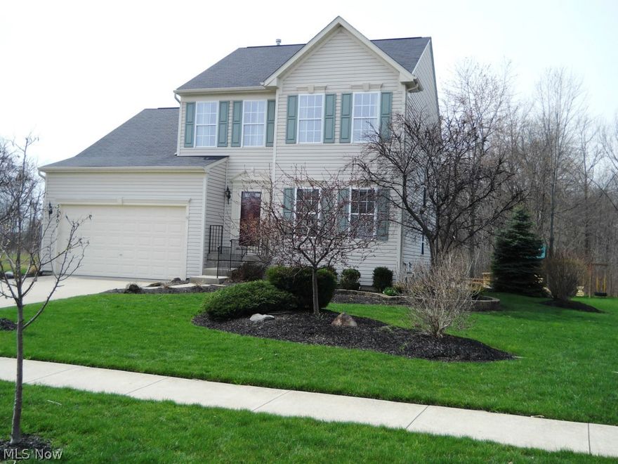 Beautifully landscaped lot backing to the Metropark. Open floor plan with neutral décor. Kitchen with large island overlooks lovely morning room/sunroom. Gorgeous master with glamour bath. Finished lower level with bar, exercise room, movie area and bath. Amazing brick patio with fire pit. Irrigation system and invisible fence. Like brand new! Move-in condition!