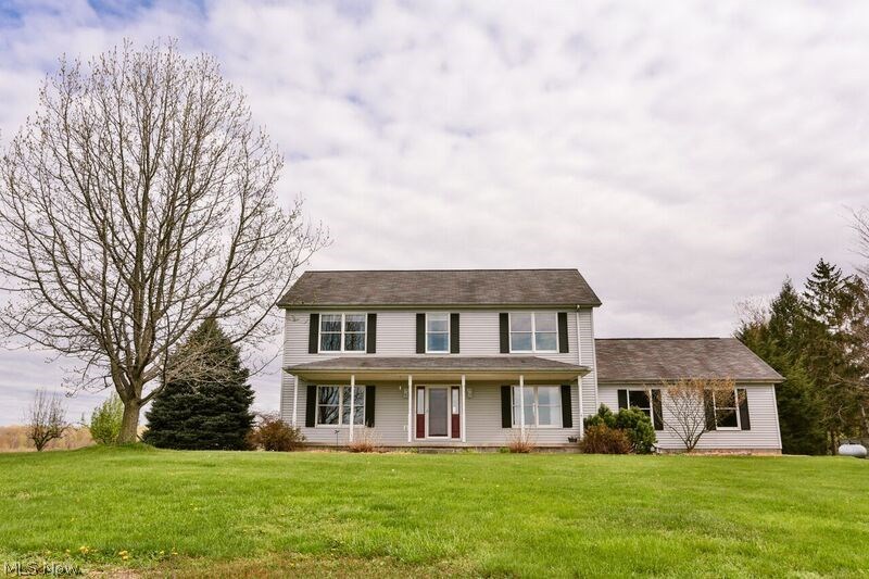 Brownhelm country colonial on 3 acres. Large family room with a gas fireplace. Spacious kitchen with maple cabinets and cork flooring, a pantry, and all appliances stay! Formal dining room for all the family gatherings. Owner's suite with a walk-in closet and private bath. Nice basement just waiting to be finished. Generous front porch for relaxing. Fenced in area in back yard for small children to play, or pets. Also has fruit trees and grape vines. Plenty of room for gardening. Close to Mill Hollow, I-90 and the Turnpike.