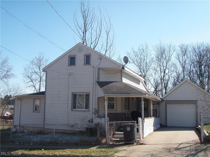 Large, nicely maintained home with 14 rooms at a great "AS IS" price. Two master bedrooms on first floor w/full bath. Large eat-in kitchen. Pantry and additional storage room off kitchen. First floor laundry. Large living room has several windows to let in natural light. Two more bedrooms and a bonus room upstairs. Family room, kitchenette, another bedroom and full bath w/claw foot tub provides an additional living suite in walk-out lower level. Furnace and A/C in 2002. Attached garage. Large covered side porch. Electric updated, window, in 1990. Roof 1997. Flat roof 2016 (new rafters, board & ceiling in room beneath).  What a great buy!