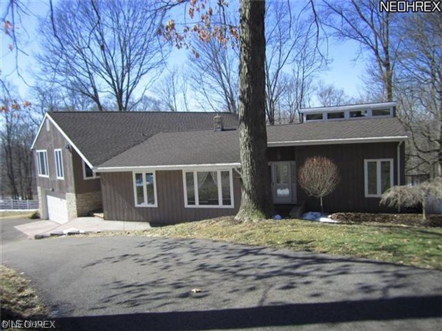 Updated country property with all the extras. Wooster School District. 9.7 Acres of quiet seclusion. 4-5 bedroom home w/beautiful cherry custom cabinets. Great room w/stone fireplace. Open floor plan, Formal living room, office, master suite w/bath. Screened in porch w/hot tub, deck, 35'x72' barn with loft. Perfect for hobbies. Fenced pastures, wooded privacy. Quality.