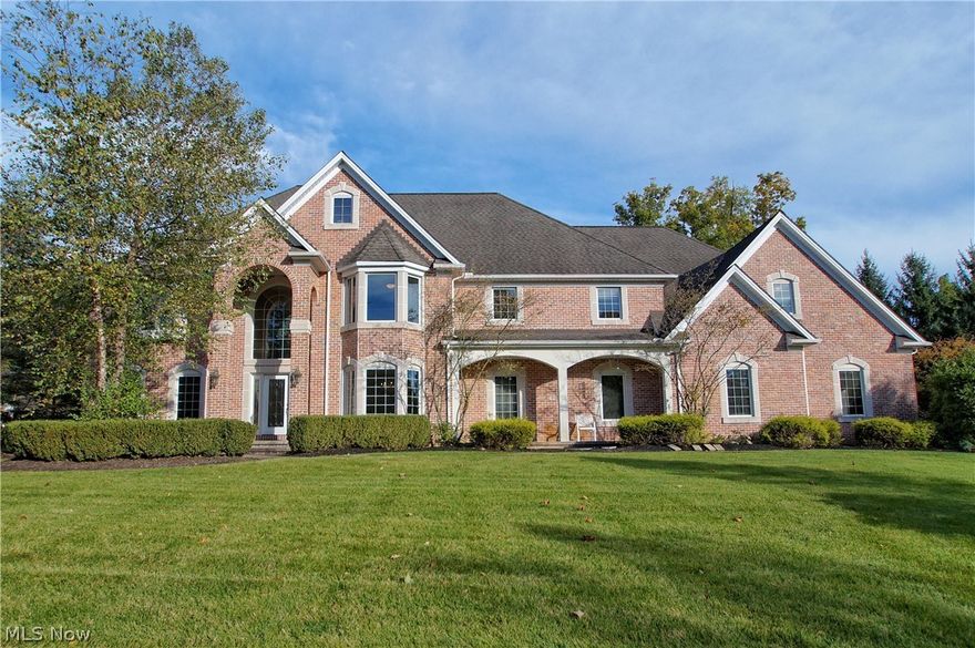 WOW! Over 8000SF of living space in that absolutely stunning 4/5 bedroom, 6 bath ALL BRICK Colonial located in the pristine Kirtland Lakes subdivision. Overlooking a pond, this home is as beautiful outside as it is inside! Are you a fan of entertaining? Do you want space that flows from an amazing indoor space to a awesome outdoor space? Does form meets function appeal to you? If so, then this home needs to be your next home! Maybe you need 2 offices? This has that. Maybe you need a really cool master bedroom design with private entrance from the garage, double master walk in closets, enormous bathroom, separate sitting room or nursery + walk up attic for storage? This has that too! Want the ultimate man-cave, teen hangout basement? Then this is perfect for you! When we say this home has everything, it really has everything! Wide open kitchen design, great room with 20' tall ceilings More storage than you can ever imagine! 4 car garage! built in hot tub on the brick patio. The list is