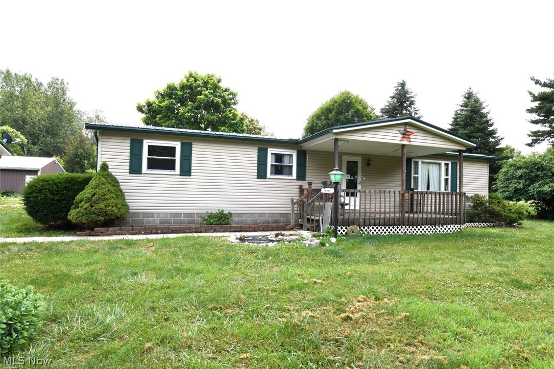 Unique property! Beautiful Setting with over 5 acres total
Manufactured Mobile home sits on one parcel with 3.03 acres Home is in good shape with 3 bedroom, 1.5 bath includes sunroom added in 1996
Property has oversized 2 car detached garage and couple of outbuildings
Second parcel has block building (previously flint museum) and sits on 2.27 acre along with shelter house