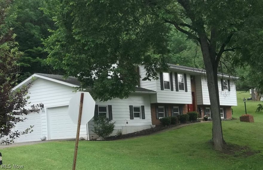 Beautiful Split Foyer on a dead end cul-de-sac! Home features 4 bedrooms, 3 baths, living room with a cozy fireplace, large family room, dining room leading onto deck over looking woods. Two car attached garage makes this home complete! Ready for you to move in to. Call our office today!