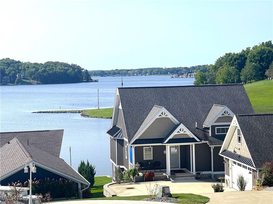 APPLE VALLY LAKEFRONT WITH THE BEST VIEW ON THE LAKE! 501 Baldwin Heights Circle. Stunning, 3-4 BR, 2.5 Bath, ABSOLUTELY Immaculate, like brand-new, custom designed & custom built in 2018, Craftsman-Style home. Lots of covered, wrap-around decking, patios and screened porch to take in the lake vibes and view. Screened porch off master suite. Completely finished, bright, walk out L.L w/wet bar, FR,  2-3 bedrooms and a covered wrap around patio. Nice, gentle walk down to the modern dock with boat and jet-ski lifts, Trex decking, sun deck and a nearly 80' quality, sturdy sea wall (see photo). Enjoy the lake life and views from so many places, including the fire ring. No-Wake Protection from being in the nicest cove on the lake, but STILL One of the most AMAZING panoramic views all the way up the lake. Great landscaping. Plush yard is sprinkled in 3 zones with Rain-Bird system with one more zone for the hanging baskets on the multiple decks/patios. Many features of this home are “SMART” with easy adjustments from your smart phone. Boat for sale, also. Only the highest quality materials and craftsmanship. Four walk-thru video shorts (each a minute or less) available on You Tube or reach out to your favorite agent for the links.