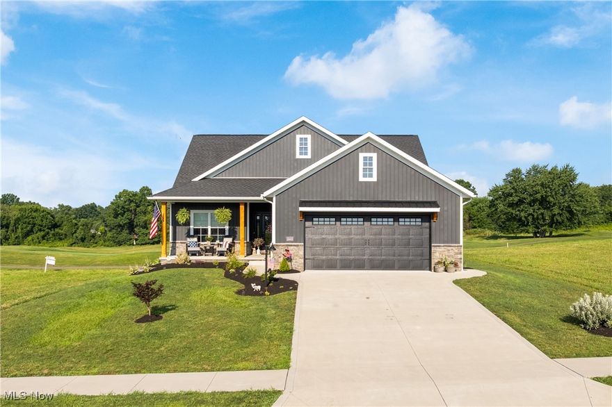 Custom Ranch Retreat located on the 6th hole of the prestigious Legends Golf Course, this stunning custom-built ranch offers luxurious, maintenance-free living in one of Massillon’s most desirable communities. Step inside to an open-concept floor plan highlighted by soaring 9' ceilings and luxury vinyl flooring throughout. The expansive white Dutch Creek kitchen is a true showstopper, featuring granite countertops, stainless steel appliances, a large pantry, and an island with seating—perfect for entertaining. The oversized family room welcomes you with vaulted ceilings, oversized baseboards, and a striking stone gas fireplace, creating a cozy yet elegant gathering space. The large master suite is your private retreat, complete with a walk-in closet and a beautifully designed master bath boasting double sinks and a marble walk-in shower with dual shower heads. Two additional bedrooms include walk-in closets, and the oversized first-floor laundry room adds convenience and function. The full basement—with 13-course walls, egress window, and plumbing for a full bath—offers endless potential for future expansion. Step into the backyard and experience a sense of openness and tranquility that defies its size. Though modest in footprint, this outdoor space lives large thanks to its prime location backing directly onto the lush, expansive fairways of the Legends Golf Course. With no rear neighbors and uninterrupted views of the manicured greens, the backyard feels endless-blurring the line between private outdoor living and scenic open landscape. Whether enjoying morning coffee on the patio or entertaining guests, the sweeping golf course vistas create a serene and spacious atmosphere rarely found in traditional backyards. HOA covers landscaping allowing you to fully enjoy no/low-maintenance living. Conveniently located just minutes from downtown Massillon and major highways, this home combines elegance, comfort, and ease in a truly unbeatable location. Schedule today!