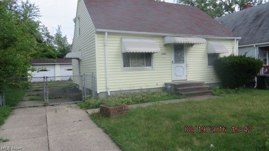 Spacious colonial with much potential.  Detached 2 car garage.  Sold as-is