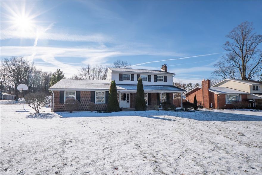 Loved by the same family for 55 years, this wonderful home is ready to welcome new memories. A covered front porch sets the tone, leading inside to multiple living spaces where everyone can gather. The living room features a wood burning fireplace, while the vaulted family room addition adds character with a beamed ceiling and skylights that fill the space with natural light. The eat-in kitchen offers oak cabinets, granite countertops, and all appliances including a wall oven, with a formal dining room nearby for larger meals. A full bath with a step-in shower completes the main level. Upstairs are four bedrooms with hardwood floors and a full bath with a tub and shower combination. The lower level provides even more living space with a finished rec room, abundant storage, and laundry area. Outside, you’ll appreciate the nice sized yard with whole yard irrigation, a private patio surrounded by fencing, and a shed for tools and equipment. All in a convenient Plain LSD location close to shopping, dining, and more. Don't miss out, call today!