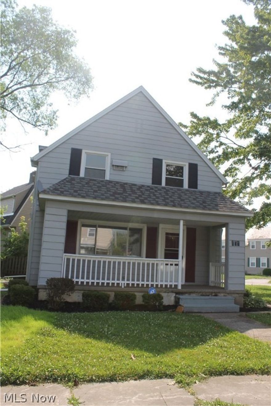 Clean, cute and ready for you! Lorain's east side on a redone street, corner lot with a nice inviting front porch. Low maintenance exterior with newer windows in like new shape, extra large side yard too. Plenty of room to add a custom garage. The interior pulls you in with neutral colors and new flooring on both floors. First floor has new easy care laminate flooring, steps and upstairs have brand new carpet. Recently installed ceiling fans and light fixtures are the icing on the cake! Very well maintained. Nov 2020 a clean out was installed in the yard at a cost of $3500. You may have either a gas or electric range and dryer as home is prepared for either. Home was reinsulated to make it cozy. The spacious first floor is waiting to entertain with the flow from the front porch, through living room and to the large dining room.