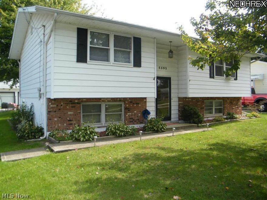 Welcome to this well maintained Bi-Level nestled in an attractive neighborhood! The welcoming Foyer leads up to the sizeable Living Room featuring newer carpeting and a large picture window. Continue into the open Kitchen offering tons of cabinet and counter space, plus a spacious Dinette with sliders out to the Deck overlooking the backyard with an oversized 2.5 detached Garage with a newer Door and Garage opener. There are 3 generous size Bedrooms on the main living level. The lower level features a huge Rec. Room, a Laundry Room and a separate Utility Room. Bag a Bargain!