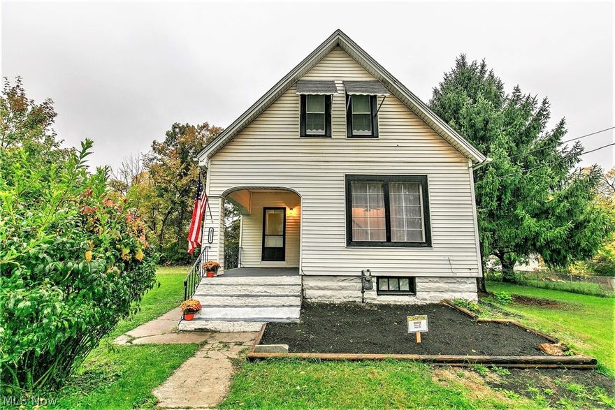 Charming 2 bedroom, 1 bath colonial has been tastefully remodeled! The welcoming covered front porch invites you into the open and airy living & dining room with new flooring flowing throughout the home.  The remodeled kitchen showcases new cabinetry, stainless steel farmhouse sink, and nice new countertops. Convenient 1st-floor laundry room. Upstairs you'll find two vaulted spacious bedrooms with brand new carpeting and a remodeled shared full bath. Relax outside on your large back deck overlooking the beautiful backyard situated on 3 parcels. One year home warranty included for buyer’s peace of mind. Call to schedule your appointment today!