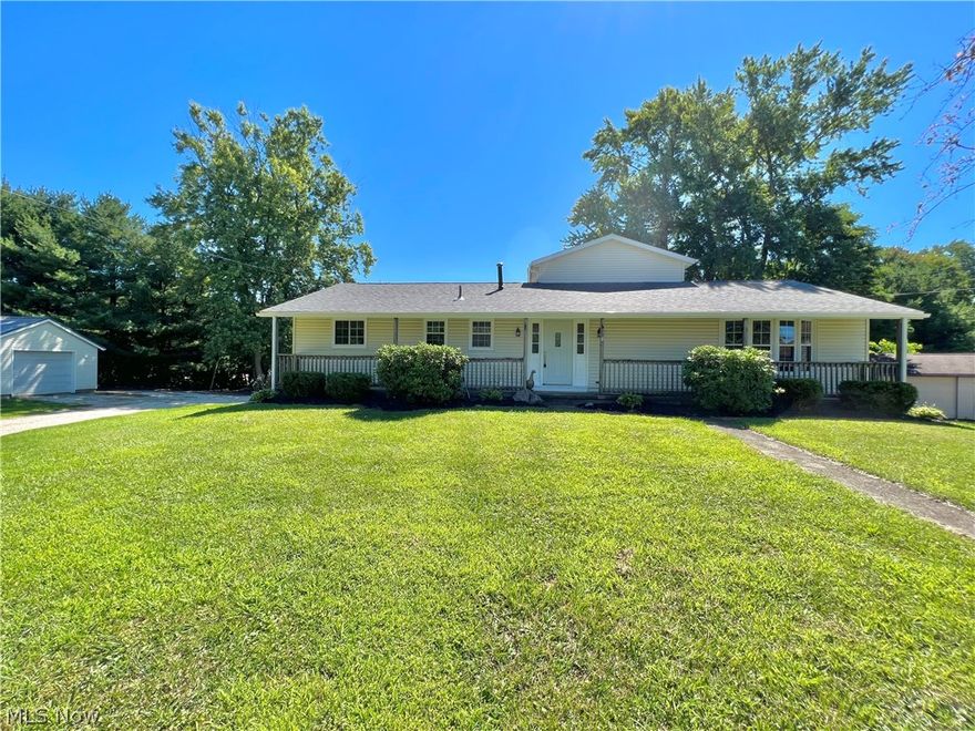 BE QUICK OR BE SORRY! Enjoy the outdoors with not 1, not 2, but 3 outdoor living areas! The front porch extends the length of the house. There is an 8X24 2nd story deck that leads down stairs into the backyard & driveway areas, & the third is a covered deck on the back of the house that measures 12X20 & has beautiful, intricate metal panels. This sprawling 5 bedroom ranch is waiting for you to call it home! Within walking distance to park & school. Enter into the spacious foyer & into the welcoming living room that has a bay window seat that then spills into the nice-sized dining room. Plenty of cabinets in the kitchen with newer built-in cooktop. Step down into the family room with newer vinyl plank flooring, a cozy fireplace, another bay window seat & sliding glass doors. You'll find hardwood floors throughout most of the first floor. This home has an abundance of storage!  There are three bedrooms on the main floor with a full bath & a 1/2 bath off of the master bedroom. Upstairs yo
