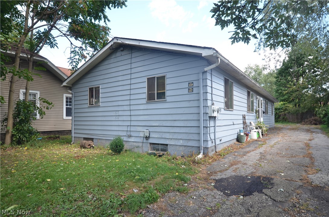Ranch style 2 unit with private basement for each unit including laundry hookup w utility sink. Each unit includes living rm w hardwood floors, eat in kitchen w access to central stairway for basement, 2 bedrooms and full bath w shower/tub. 1 Range and 2 Refrigerators are owned by the seller and stay with the property. Unit 157 includes an updated Lennox furnace and updated electrical panel. Owner pays water/sewer/trash bill. Tenants pay all other utilities. Unit 157 rented for $400 per month since January, 2013.Unit 159 vacated for ease of showing. Both properties are month to month basis. All initial showings will be ONLY for the rear unit, 159. For a 2nd showing we can set up the front unit with 48 Hours advance notice. Seller water/sewer/trash bill was typically around $130 per month when fully occupied. An additional interior meter is located in the basement of unit 157, so the tenants could use that to split the water/sew bill in the future and determine the portion of the bill f