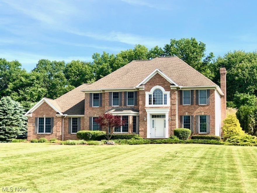 Fabulous colonial nestled on 2+ acres on cul-de-sac with wooded backdrop, presents over 3800 sq ft of living space.  Gracious two story foyer leads to  elegant formal dining room with wainscoting and bay window.  Inviting formal living room offers French doors to family room.  Engaging family room boasts brick fireplace flanked by built-ins, wall of windows, and opens to kitchen. Gourmet kitchen features maple cabinetry, granite counters, center island/breakfast bar, walk-in pantry, all appliances including double ovens and gas cooktop, and planning station.  First floor laundry, separate mudroom, and guest bath are conveniently located.  Luxurious master suite highlights an intimate lounge/sitting room area and glamour bath with soaking tub, separate shower, and WIC. Three additional generous sized bedrooms, main full bath, and loft area complete the second floor.  The finished lower level offers recreation room, office/multi-purpose room, and full bath. 14 course basement with ample