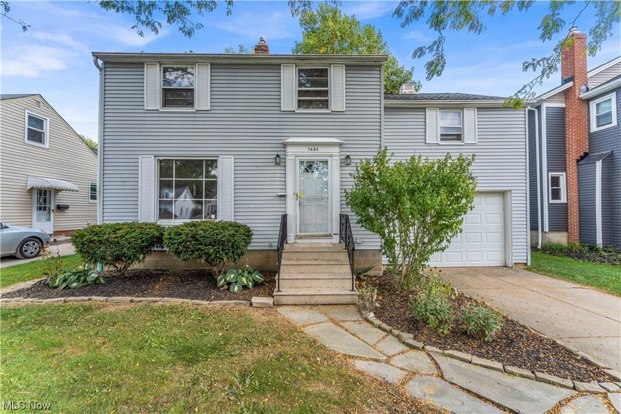 This beautiful single-family colonial home has so much to offer! Walk into the living room featuring a large picture window overlooking the yard allowing for tons of natural light! The living room has built-in shelving and gorgeous hardwood floors that continue throughout the home! Continue through to the dining room that has a door leading out to the spacious four seasons room! This room offers floor to ceiling windows allowing for tons of natural light to flow in while relaxing or entertaining! The kitchen features tiled backsplash and cabinets that wrap around the room! Off of the kitchen is a convenient half bathroom! Make your way upstairs where you will find 3 incredibly spacious bedrooms! The gorgeous hardwood floors continue throughout the upstairs as well! The upstairs is complete with a full bathroom featuring tiled walls and a shower/tub combination! The partially finished basement is the perfect space for a rec room, playroom or additional living space! The basement also offers space for storage and a laundry area! Outside you will find an attached 1 car garage and spacious fenced-in backyard! With easy highway access, this is close to Downtown Cleveland! Near food, shopping and public transit, this won't last long! Schedule a showing to see it for yourself!