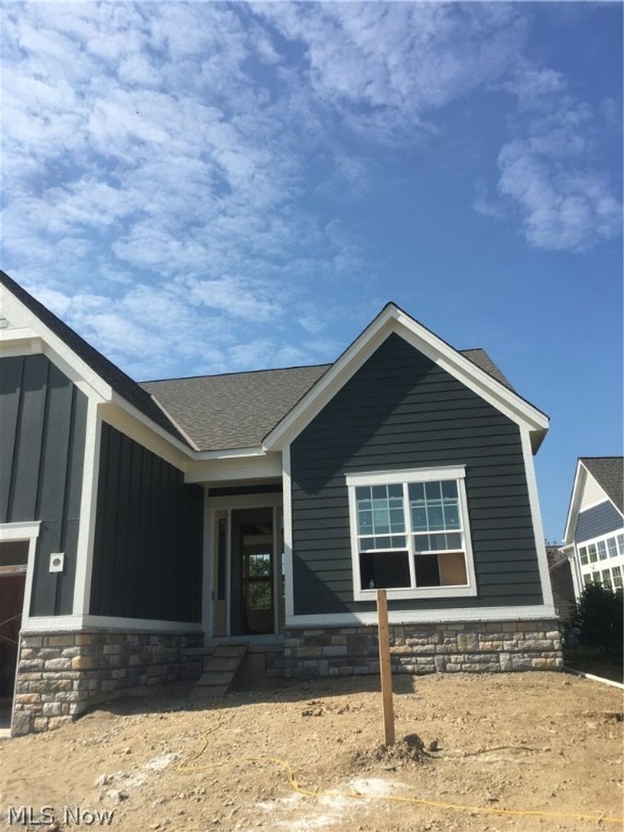 New custom built Patio Home featuring 3 Bedrooms, 3 Bathrooms, and hard to find 3 Car Garage in the beautiful, tranquil Villas of Loch Lomond! Built by Consumer's Choice #1 Custom Builder, this home feature's a Chef's Kitchen with extra large island, quartz counter tops, stainless appliances, and quality cabinets. Open concept floor plan with 10 ft. ceilings throughout, wall of windows to let in lots of natural light, custom trim & details. Owner's Suite with spa-like Bath and large walk-in closet. Second guest suite or Den on the first floor. Finished lower level with large Rec Room, guest bedroom and full Bath. Covered Patio to enjoy the outdoors and entertaining. Lawn care and snow removal are provided in this Simplified Living Community so you can just relax and enjoy!