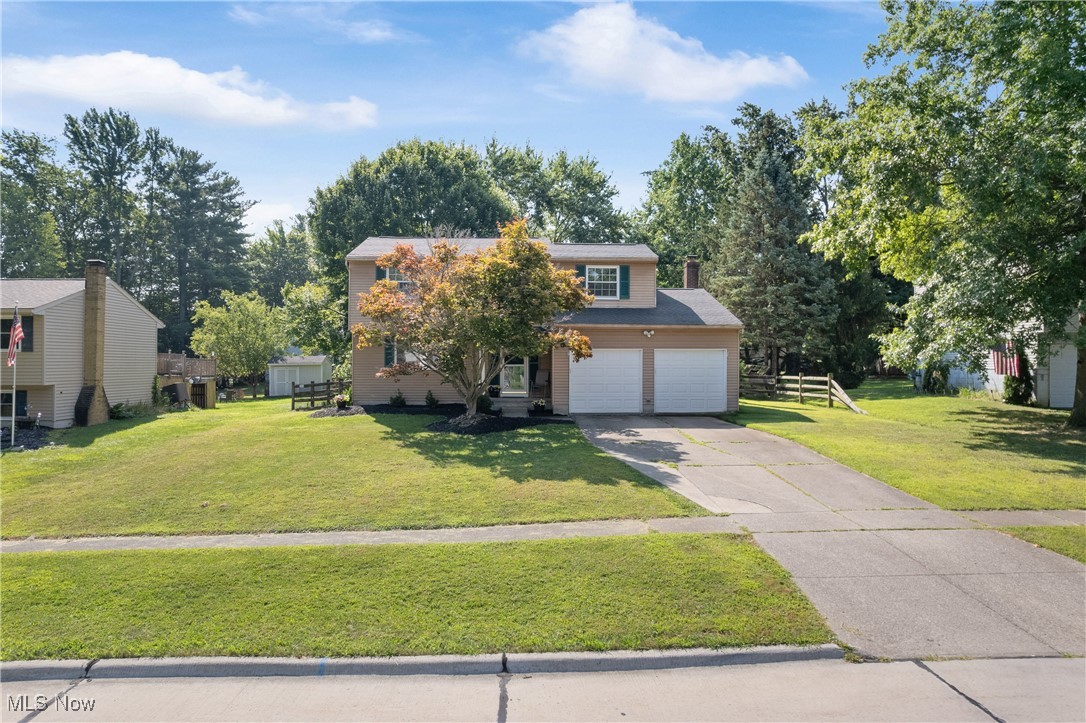 Prime Medina location within walking distance to Falling Oaks Pool, Reagan Park, and Roscoe Ewing Park, and just minutes from downtown Medina, and 10 minutes to I-71. This 4-bedroom, 1.5-bath home offers over 1,600 sq. ft. on the main level plus 525 sq. ft. of finished basement space. The main floor features two living areas, one with a wood-burning fireplace, along with a dining room, kitchen with generous cabinetry and counter space, and a half bath. Upstairs includes four bedrooms and a full bath. The home has brand new carpet throughout the ENTIRE home! The lower level offers a recreation room and storage. Additional highlights include a two-car garage, fenced backyard, and deck. This home is also located on a dead-end street. Start or restart your future in this great home, which just happens to be in the perfect location!