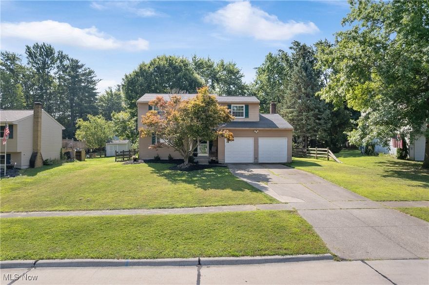 Prime Medina location within walking distance to Falling Oaks Pool, Reagan Park, and Roscoe Ewing Park, and just minutes from downtown Medina, and 10 minutes to I-71. This 4-bedroom, 1.5-bath home offers over 1,600 sq. ft. on the main level plus 525 sq. ft. of finished basement space. The main floor features two living areas, one with a wood-burning fireplace, along with a dining room, kitchen with generous cabinetry and counter space, and a half bath. Upstairs includes four bedrooms and a full bath. The home has brand new carpet throughout the ENTIRE home! The lower level offers a recreation room and storage. Additional highlights include a two-car garage, fenced backyard, and deck. This home is also located on a dead-end street. Start or restart your future in this great home, which just happens to be in the perfect location!