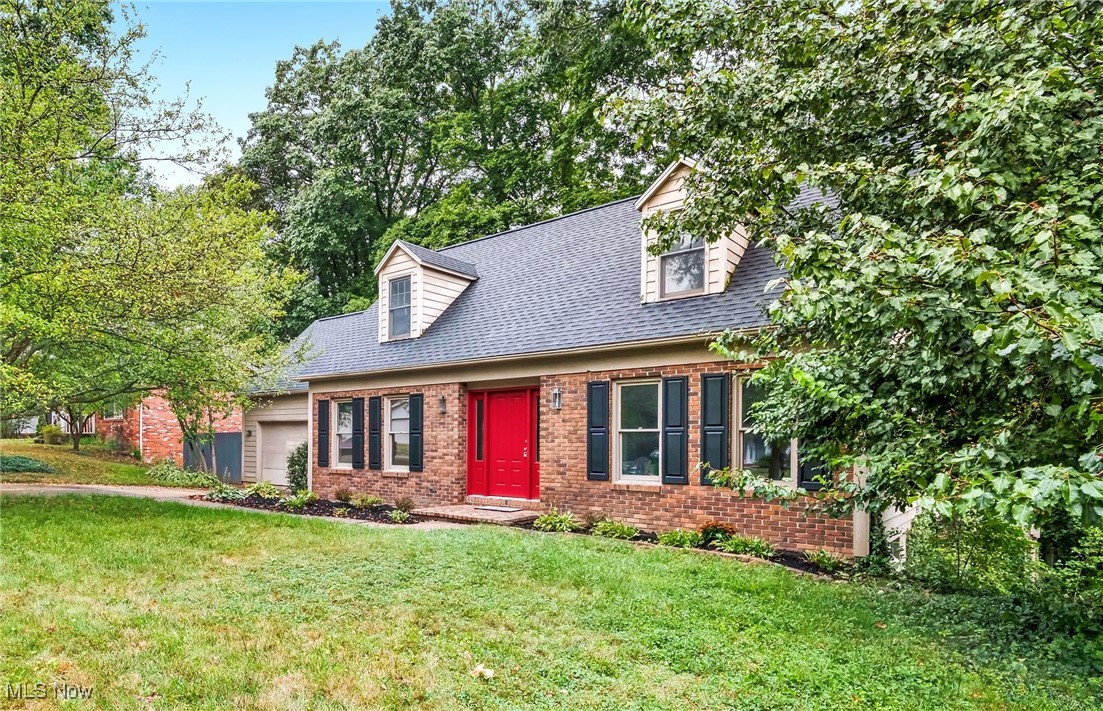 Welcome to 1238 Kieffer St in Wooster, a beautifully updated 4-bedroom, 2.5-bath home filled with character and modern touches. This residence greets you with ample curb appeal and continues to impress inside with new flooring throughout and plenty of bright natural light. The kitchen has modern white cabinetry, an updated stove and refrigerator, a spacious island with breakfast bar, and the removal of a wall has created an open and airy flow into the living area. The cozy living room centers around a charming fireplace with built-in shelving on either side for added storage. Shelving has also been added into the dining room for additional storage space. Outdoor living is a highlight with a screened-in deck for seamless indoor-outdoor enjoyment, a freshly repaired and painted open deck, and even a hot tub with partial enclosure for year-round relaxation. A finished basement adds versatile living space, perfect for entertaining or a family hangout. The backyard is a retreat of its own with a fun treehouse, making this property truly unique. Other updates include a new front door, back sliding doors upstairs and down, and shutters. With thoughtful updates and plenty of charm, 1238 Kieffer St offers comfort, style, and functionality in the heart of Wooster.