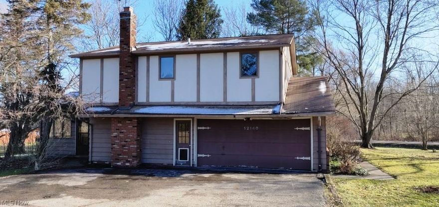 Tons of space and potential in this 4 bedroom home, formal living area and family room with fireplace, full basement with shelving and more.