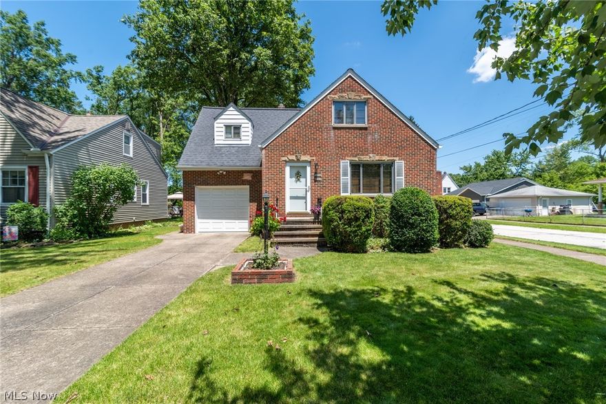 Just walk in and you’ll fall in love with this exceptionally well maintained 3BR / 1.5BA Brick Cape Cod style home nestled in a highly desirable quiet park-like area. The Living Room and dining area have gorgeous newer laminate flooring, gas fireplace (with heater), and neutral décor. The Kitchen features plenty of cabinet space, Fridge, Stove, and stand-alone Dishwasher.   The upstairs features 3 bedrooms with exposed red oak hardwood flooring and a full bath.  The carpeted stairway and hall have original hardwood underneath.  The home is situated on a .22 acre lot that is 190’ deep and offers plenty of room for children and/or pets to play. The backyard is fully fenced and features a fabulous two-tier deck overlooking the beautiful landscaping and large shed for even more storage. The Furnace and AC were replaced in 2009. Updated Electrical. All appliances are included. The basement is semi-finished and features a laundry area, recreation room, and glass block windows. Spacious attac