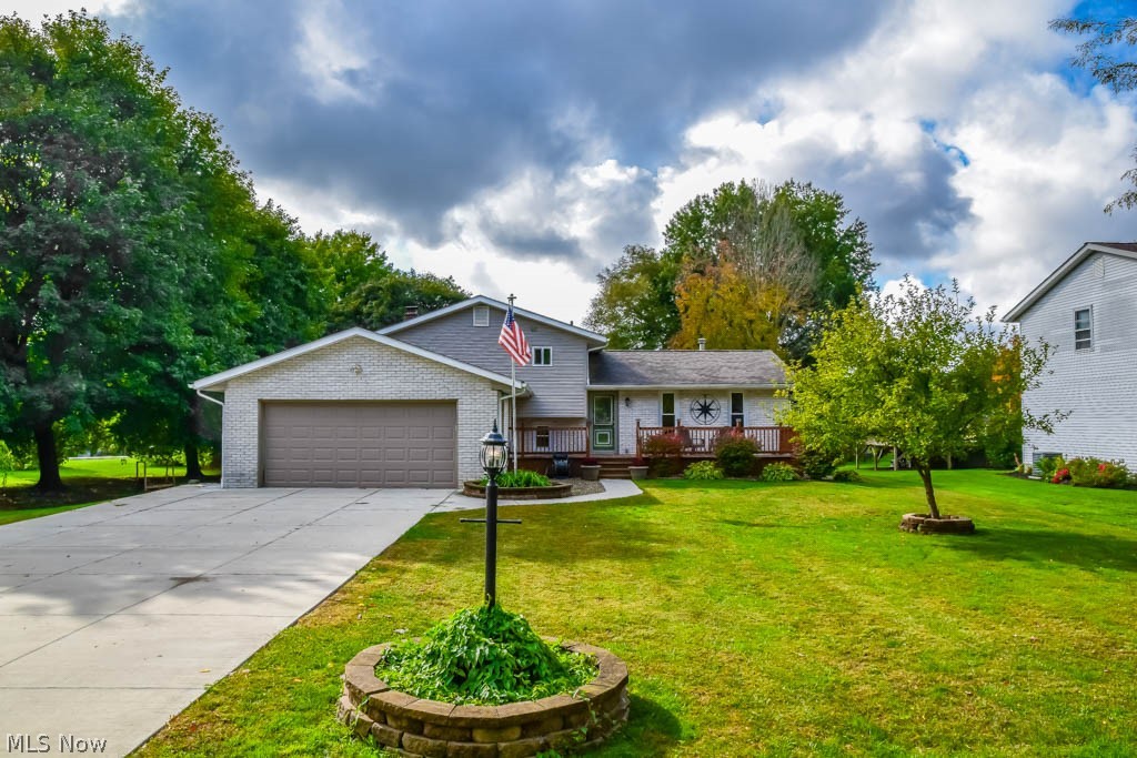 Gorgeous 3 bedroom, 2 full bath 4-level split filled with updates in Lake LSD! This home has been completely transformed over the last 10 years with new siding, drywall, flooring, windows, roof (8 years), furnace/AC (9 years), siding, newer concrete driveway, underground dog fence and more! You’ll love the gleaming hardwood floors throughout the main level. Prepare your favorite dishes in the updated, fully applianced kitchen with white cabinets, 2 lazy Susans, a pantry, desk/mail drop spot and dinette! Hardwood floors continue up the stairs, into the hallway and in all 3 bedrooms. The master bedroom has a closet organizer and direct access to the updated full bath with a linen closet and beautiful vanity. Gather in the spacious front living room or head downstairs to the huge family room with a sliding door to the back patio. Remodeled full bath around the corner with a walk-in shower. The huge laundry room is off of the garage making it the perfect drop spot for coats and shoes. It e