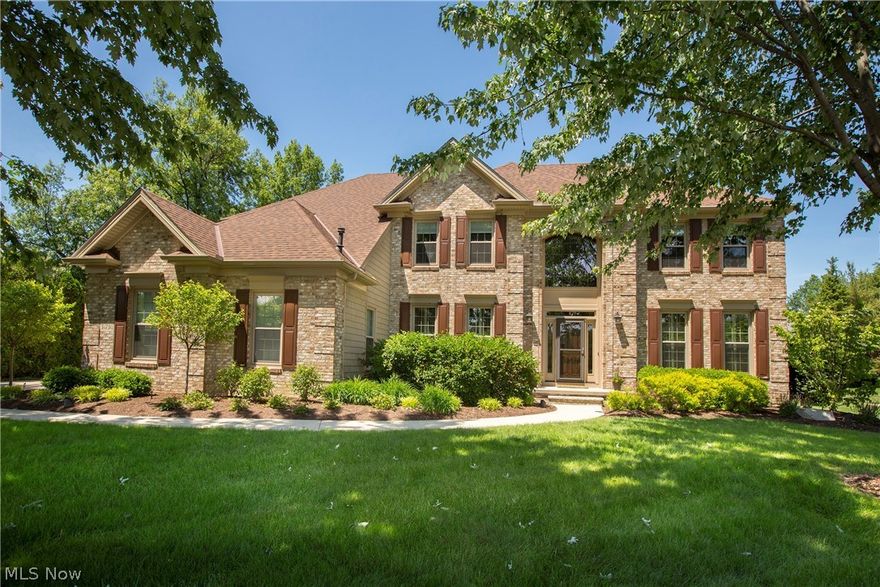 Prepare to be Moved!...Into this stunning custom built colonial in the sought after Westwinds Community! Why build when you can move into this like-new gorgeous home today? This custom home boasts many high end details and is situated on a quiet cul-de-sac lot with 4-car side entry garage. Welcoming 2-story foyer features updated gorgeous bamboo flooring which flows throughout home with formal dining room and living room just off the foyer. Entertain in the open & airy 2-story Great Room with floor-to-ceiling palladian windows & beautiful gas fireplace. Enjoy cooking in the updated gourmet kitchen (2015) with Jenn-Air commercial SS appliances, quartzite countertops, and large island with prep sink. Your dream laundry room awaits you off the kitchen with lockers, island and storage galore! Additional garage bay, office and half bath added in 2001! Upstairs, Master Suite has walk-in closet & gorgeous renovated master bath with dual vanities & arched ceilings. 4 additional bedrooms & 2 fu