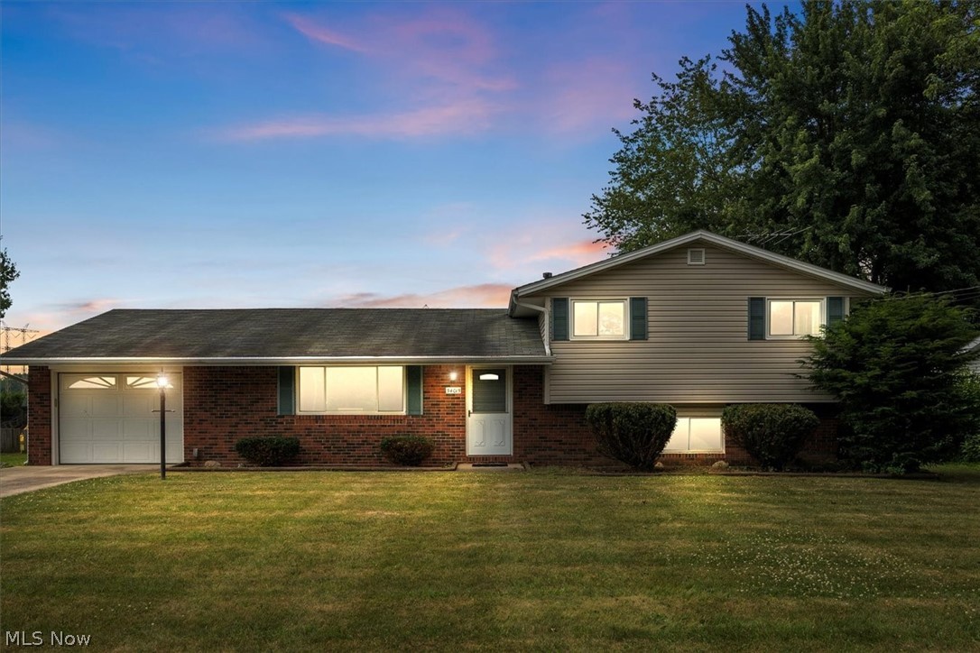 This split-level house, located on a quiet street, features three bedrooms and 1.5 bathrooms across three levels. All bedrooms are on the upper level with a full bath. The main level features the kitchen, dining room, and living room. The lower level includes a spacious family room with a wood-burning stove, a half bathroom, and a sizable utility room. The property boasts a flat backyard with a shed for your tools and acres of open field behind it. A covered porch extends off the back of the house as well. A new A/C unit was installed in 2023 and windows were replaced in 2015. Make your appointment to see it today!