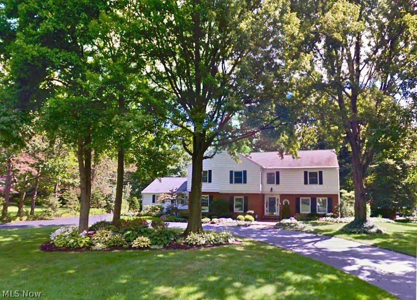 Location Location Location. Classic Colonial in the Heart of Fairlawn Heights! Private, park-like, large yard with stone patio and lush landscaping. 4 BD/3.5 BA with NEWER kitchen and master bath with spa shower! Hardwood floors, Solid wood 6-panel doors, crown molding and three (3) fireplaces! Spacious foyer with both Front and Back doors. Elegant Living Room leads to Sun room with new ceramic tile floors overlooking backyard. Large formal Dining Room with hardwood floors. Cozy Family room with peg floors, gas fireplace, wet bar and built-ins. Custom kitchen: granite counters, top-of-the-line cabinets and large leaded glass china cupboard, stainless appliances, garden window above sink, and new ceramic tile floors. Large sunny breezeway leads to garage - could be converted to first floor laundry room. Large bedrooms with excellent closet space. Spacious master with newer bath and double sinks. Master includes both walk-in and wall closets. Whole house fan, cedar closet,