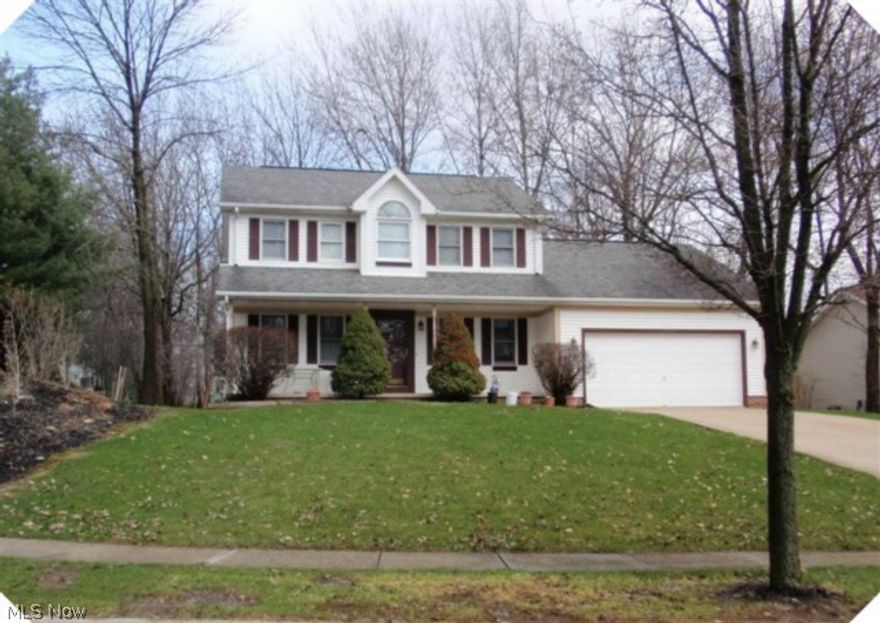 Welcome to this stunning former builder's home that offers beautiful extensive wood treatments throughout the home & is situated on a treed lot. Formal living & dining rooms, family rm with brick fireplace, staircase to second floor, & door to 16x20 patio. The kitchen has corner sink so the cook can enjoy her guests while making preparations. The eating area is surrounded by bow window to enjoy watching the birds & squirrels play. Entering from garage is a mud rm for coat & boot storage, entrance to laundry rm & half bath in this area. The 2nd flr offers oversize bedrms w/walk-in closet in Master & updated bathrm. Two large bedrms & another full bath finish off the second flr. The full basement is partially finished & makes a great game room. The workshop alcove in garage is the handyman's delight. It offers bright lighting, shelving for storage of nuts & bolts, & counter space for the equipment. This home is located on a quiet cul-de-sac in the heart of Stow.