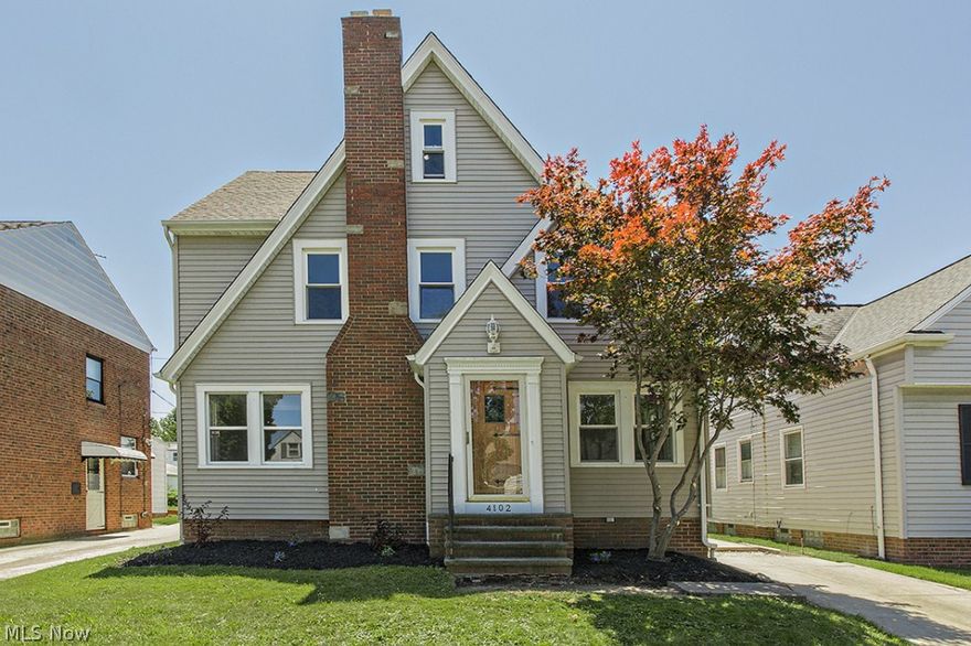 Beautifully remodeled 4 bedroom Tudor.  Updated kitchen and bathrooms, finished basement, refinished wood floors on first floor, sun room off living room, newer carpet in bedrooms, newer concrete patio in back, large eat-in kitchen plus formal dining room, fire place in living room, finished 3rd floor with walk-in closet.  Hurry won't last!