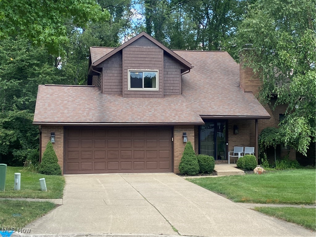 Move in ready!!! Totally updated pristine condition cluster home with affordable HOA fee. All one level living even though it's a two story home. Main level features a living room with gas fireplace, large primary bedroom with full bath, dining room, half bath and laundry area. Second story with 2 additional bedrooms and full bath gives you plenty of space for overnight guests. Open loft perfect for a reading room, kids play room or at home office. Finished lower level is one huge open space making it perfect for large gatherings, plenty of storage space and walks out to an enclosed porch/patio. Located in a quiet cul-de-sac with very little traffic. Make your appointment today!!!