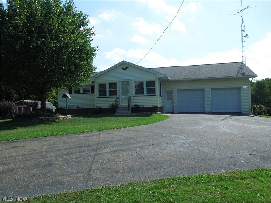 What a fantastic setting with beautiful trees on a one acre lot!  This home is perfect or the family who wants to escape the city bustle!  This 2 bedroom 2 bath ranch sits on one acre and features, central air, whole house generator, enclosed front porch with heat, 3 car garage, nature stone in the 2 car garage, 3rd car garage attached in back, recreation room in the lower level with a kitchen ,walk out basement with a covered patio, glass block, newer windows and updated electric.  Agent is related to the seller.  Call for your private showing today!