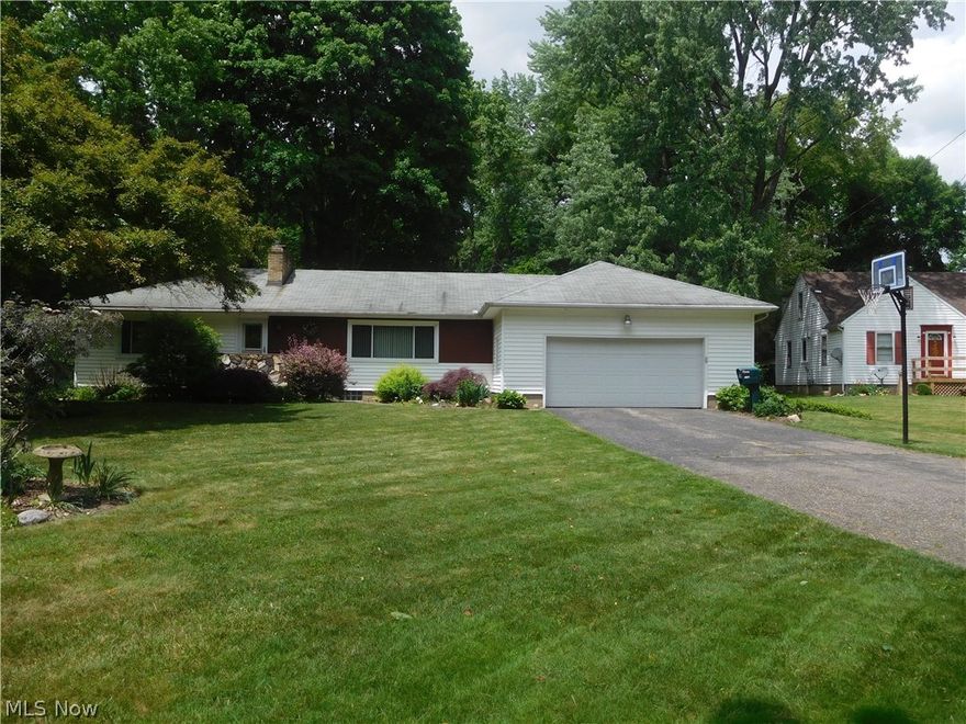 You WON'T want to miss this chance to own a fabulous three bedroom ranch conveniently located just minutes from Rt 8, shopping, park and restaurants!  Newer exterior front door in foyer greets you and flows into a HUGE living room with gorgeous wood floors, large picture window and stone wall woodburning fireplace!  Formal dining area w/newer light fixture, another large window to allow plenty of light in and a door that leads directly to the backyard.  Spacious kitchen complete with oak cabinetry, granite countertops, newer sink and an eat in area perfect for daily dining, there's also a pantry for additional storage!  First floor 1/2 bath conveniently located near backdoor/entry to garage.  Large master bedroom with plenty of closet space, two other good sized bedrooms and a full bathroom complete w/updated mirror, vanity, flooring.  But that's NOT ALL!!  The basement is ENORMOUS!!  Family room area complete w/carpet and another fireplace!  Plenty of room for storage, a potential off