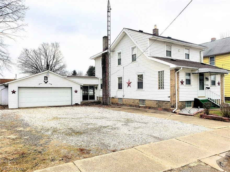 **ABSOLUTE AUCTION** **WED. MARCH 20TH @ 5:30PM** Vinyl sided two story home in convenient NE Canton location near schools, shopping and transportation features convenient enclosed front porch room, living room, dining room, kitchen w/ laminate flooring, plenty cupboards, stainless sink  & dining area, first floor full bath w/walk-in shower. Second floor w/3 bedrooms, master bedroom w/walk-in closet & ceiling fan, 2 additional bedrooms and full bath w/tub/shower. Full basement w/glass block windows, F.A. gas furnace & central air, 100 amp circuit breaker electric, water softener, washer/dryer hook-ups, and nice enclosed patio. Additional features include vinyl replacement windows, newer entry doors, dimensional roof, private drive w/large parking area w/pull through to alley, attached 5+ car garages w/2 overhead doors & entrance to street & alley, fenced back yard, 80’x120’ lot & all city utilities. Excellent investment opportunity!! Current taxes $474 per 1/2 yr. Open for viewing one