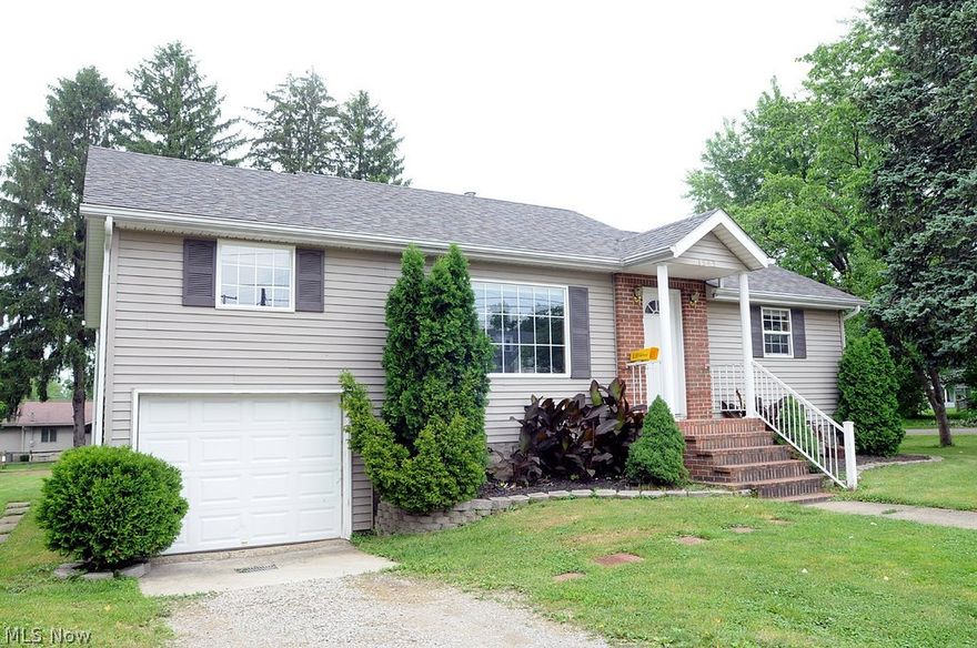 Darling home in wonderful north end location. Large, level yard featuring 3 lots. Updated kitchen with breakfast bar and stainless appliances. Former garage was finished into the current family room for additional living space. The basement has a room that is great for recreation/play room. Situated on a corner lot within walking distance to the elementary school, The Y and the city park. $12 MWCD Assessment included in taxes.  The seller is providing peace of mind to the new owner of this home with a HSA Home Warranty valued at $425.