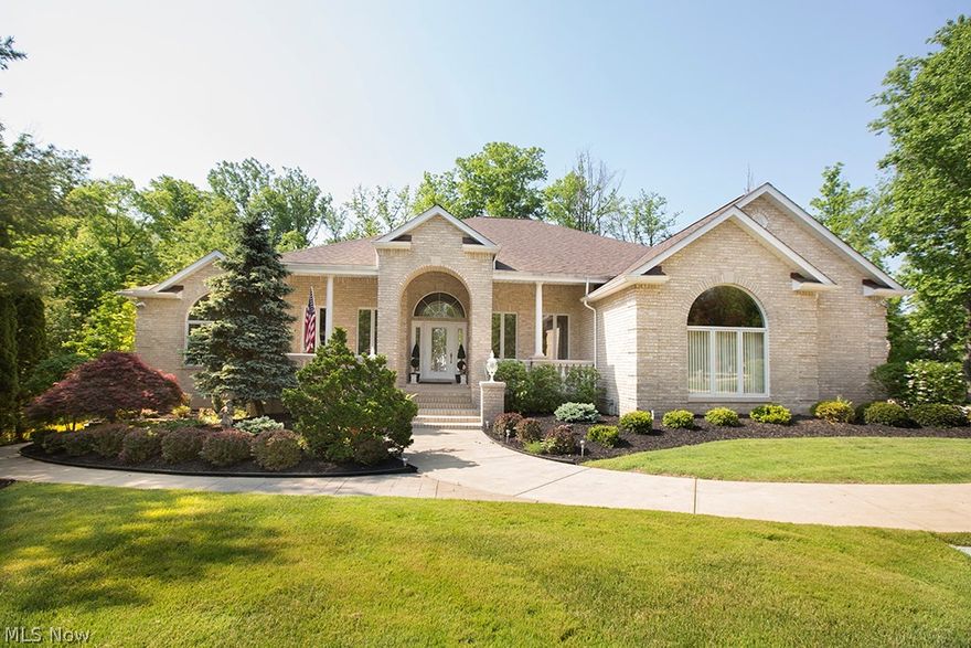 This exquisite built home was the builder’s personal design & residence. Truly one of a kind, the architectural features, workmanship & materials are second to none. Located in Nottingham Woods, the home is situated on a 1 acre, wooded lot designed to complement its surroundings. Impeccably maintained, the owner spared no expense in preparing the home for market: new roof 2017, refurbished deck, updated landscaping, freshly painted interior & new carpet throughout 2018. The home features 12 foot, triple tray ceilings, coffered & vaulted ceilings, arched thresholds, built-ins in the study, living room & family room, and 3 gas fireplaces. The finished walk-out boasts large garden windows allowing for tons of natural lighting. There is an incredible amount of living space offered in the lower level which includes a fireplace, full bath & multiple closets for storage. An all brick ranch of such quality & condition is a rare find – treat yourself with a showing of this beautiful property.