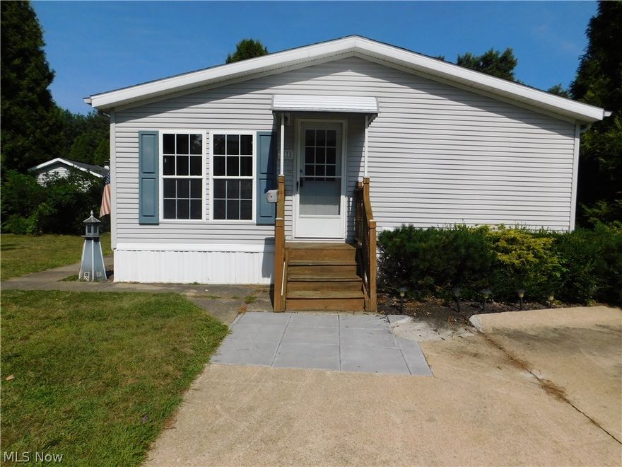 This home has a great, spacious layout. Beautiful kitchen with an island and plenty of storage. Master bedroom with ensuite that has double sinks, a skylight, garden tub and shower. Wonderful wooden deck and sunroom that adds additional space.
