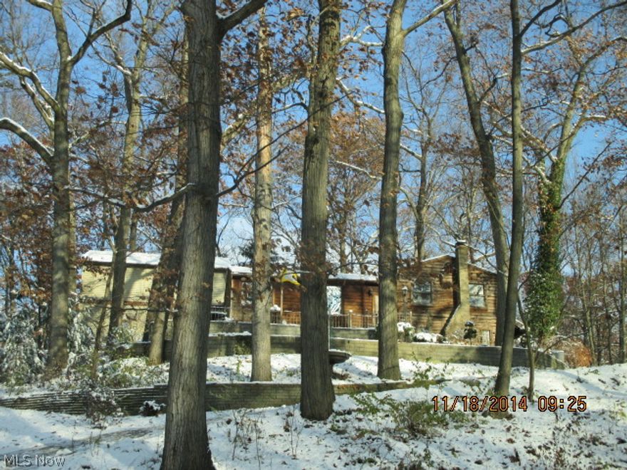 Private Setting in a secluded neighborhood but still close to everyday needs. For the mechanics this is a most buy with  4 detached and 2 car attached garages to work on your latest projects. Plenty of room for entertaining in your family room by the fireplace.